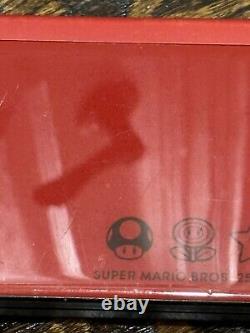Nintendo DSi XL Super Mario Bros 25th Anniversary Edition + Charger/Case & Game
